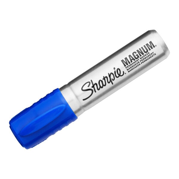 A close-up of a Sharpie Magnum blue chisel tip marker with the word "Stanley" on it.