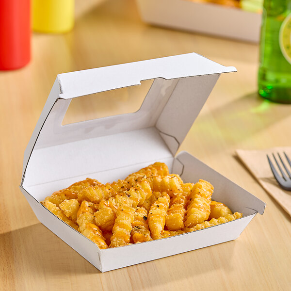 A white corrugated clamshell container with a window, holding crinkle-cut fries.