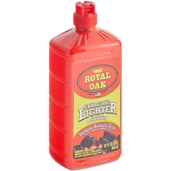 A case of 12 red plastic bottles of Royal Oak charcoal lighter fluid with yellow labels.