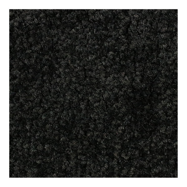 A close up of a black M+A Matting entrance floor mat.