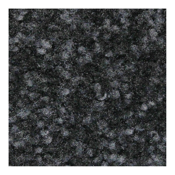 A close-up of a charcoal heather M+A Matting carpet with a rubber border.