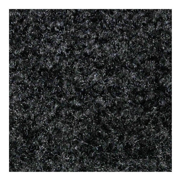 A close-up of a black M+A Matting carpet with a rubber border.