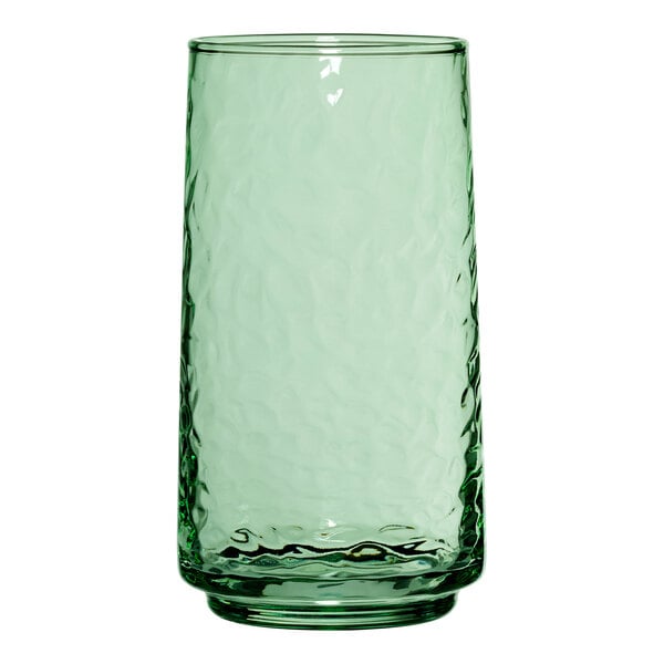 A close-up of an Anchor Hocking Brockhill Fern Green Cooler Glass with a textured surface.