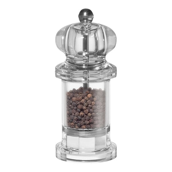 A Kuchenprofi acrylic pepper mill with round brown peppercorns inside.