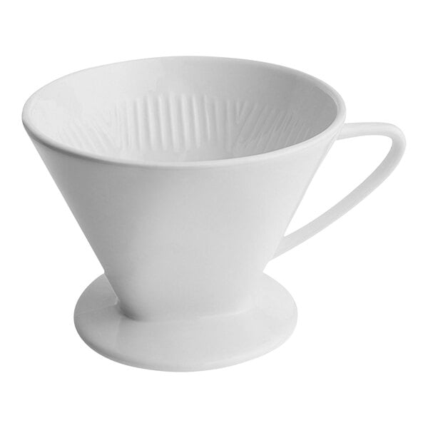 A white Cilio porcelain coffee dripper over a white surface.