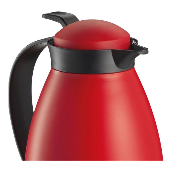 A red and black Cilio Imola insulated carafe.