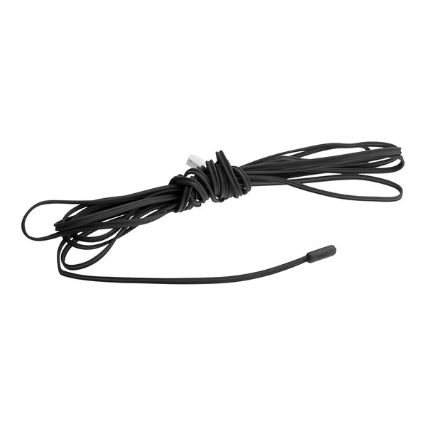 A black temperature probe with white and black connectors on a black cord.