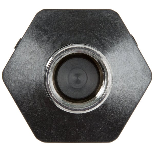 A black hexagon with a silver center.
