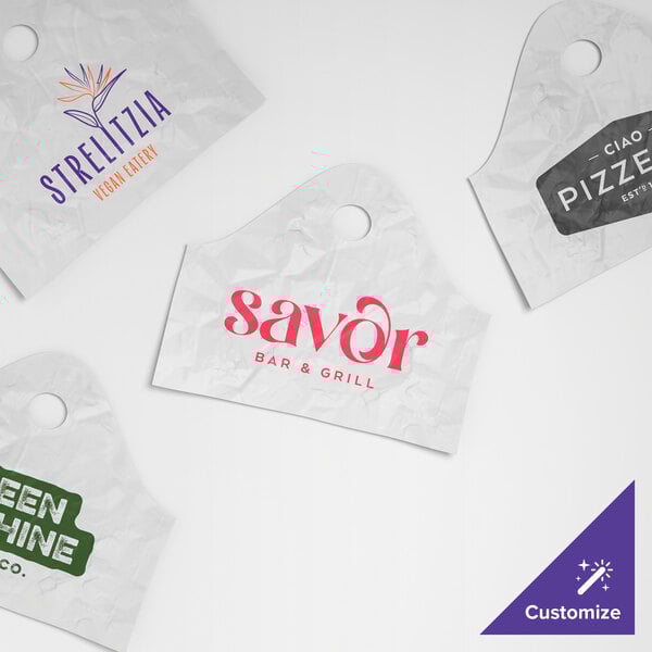 A set of white standard-duty plastic wavetop bags with various custom printed restaurant logos.