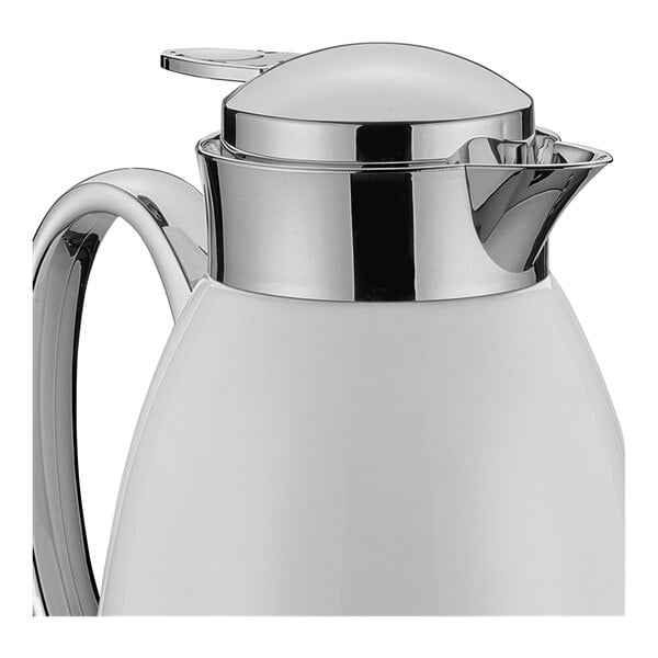 A white and silver stainless steel Cilio Venezia coffee carafe with a lid.