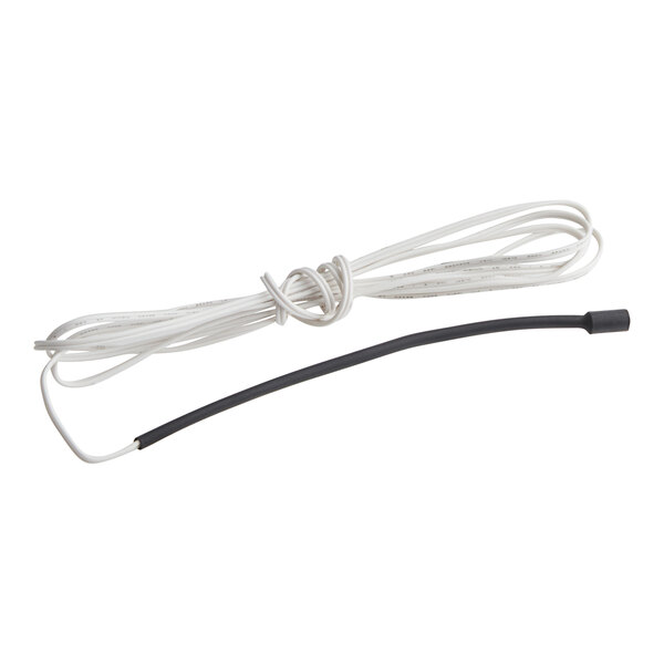 A white wire with a black end attached.