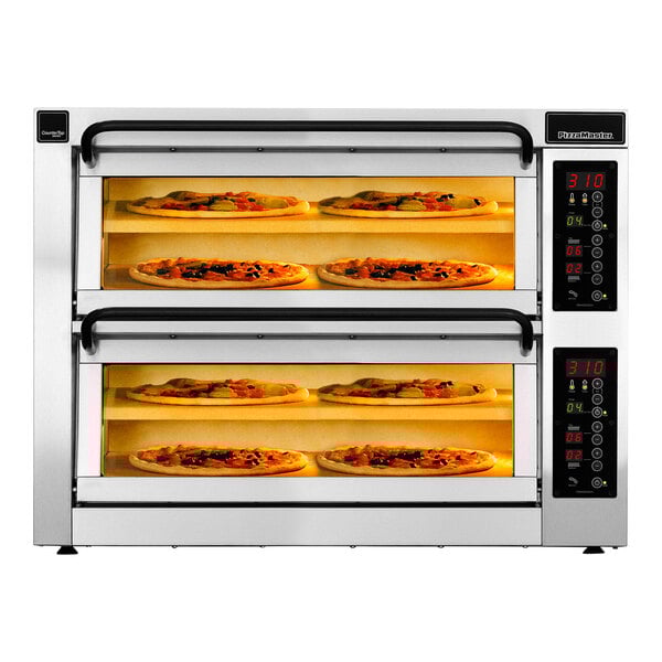 A PizzaMaster electric double deck countertop pizza oven with several pizzas inside.