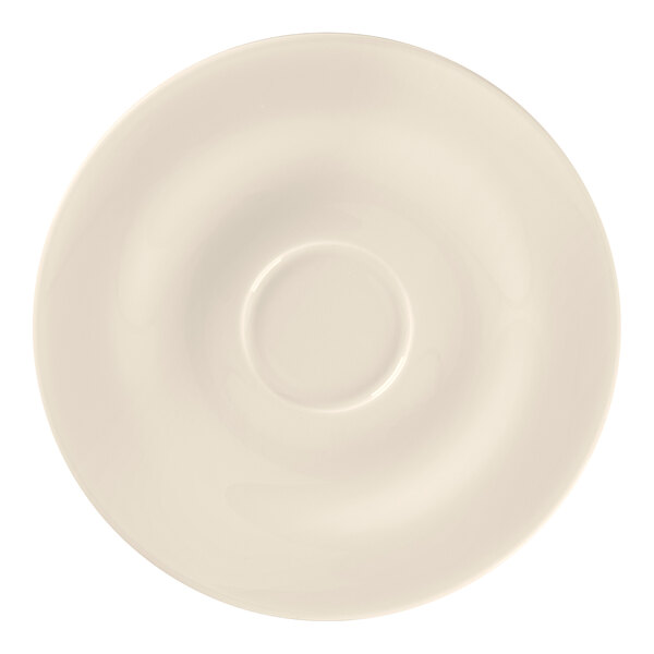A white RAK Porcelain saucer with a circle in the middle.