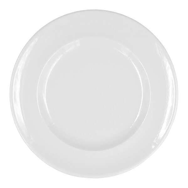 A close-up of a RAK Porcelain white flat plate with a white rim.