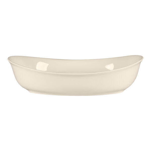 A white oval divided vegetable dish from RAK Porcelain.