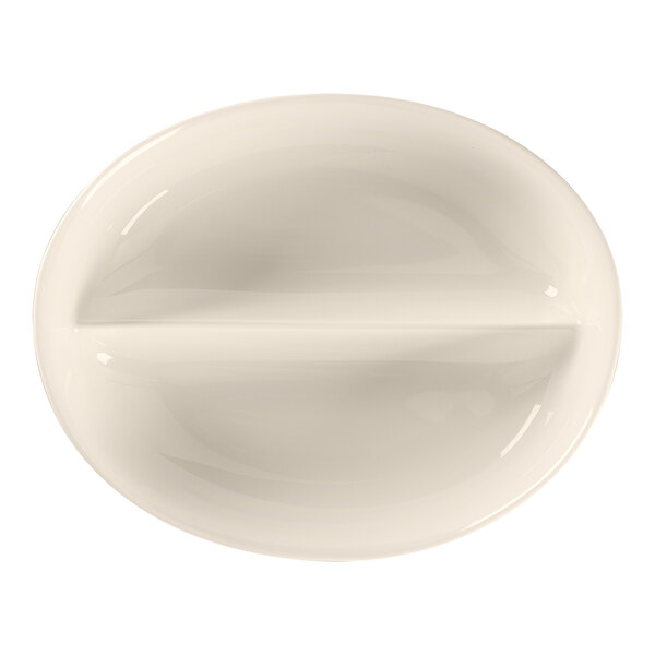 A white oval bone china dish with two sections and two handles.
