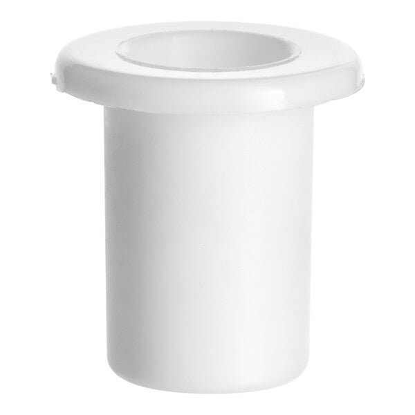 A white plastic door bushing with a hole in it.