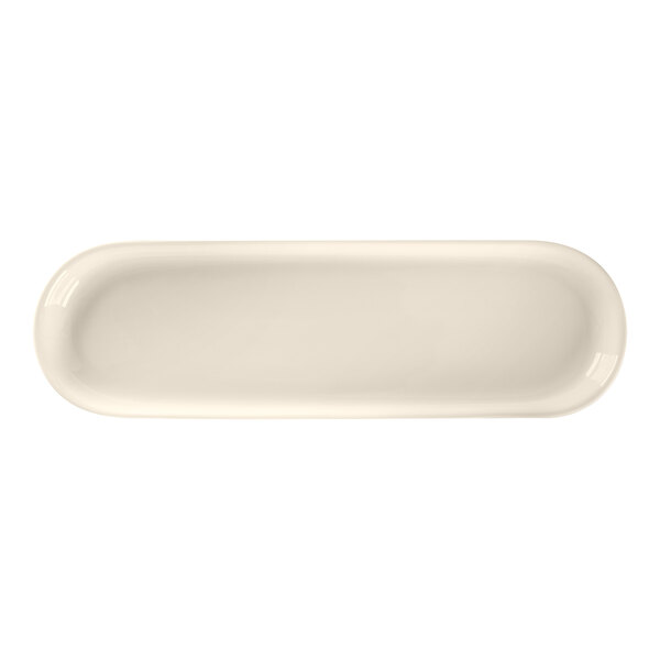 A white rectangular RAK Porcelain tray with a long handle.