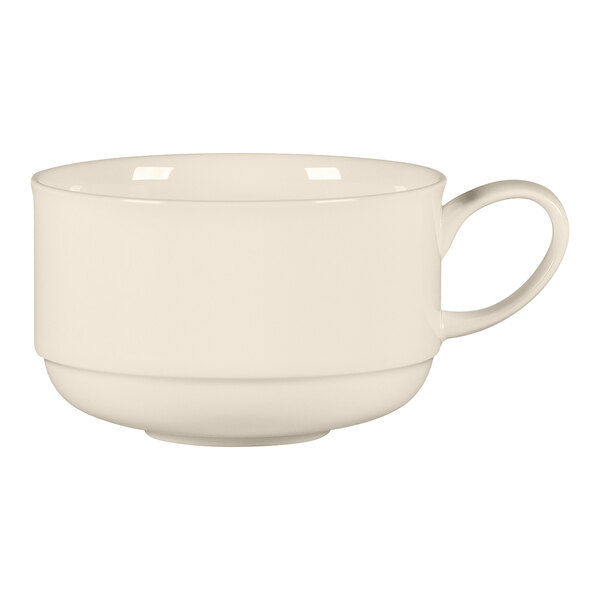 A close-up of a RAK Porcelain white bone china tea cup with a handle.