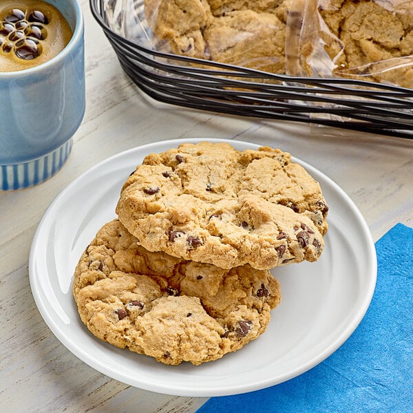A plate of Southern Roots individually wrapped vegan chocolate chip cookies on a table.