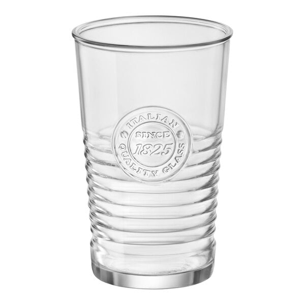 A close-up of a clear Officina Bormioli Rocco tumbler with a logo.