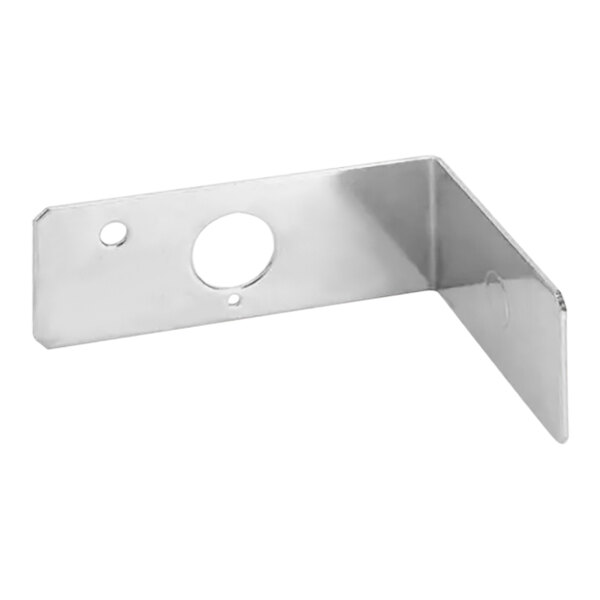 A stainless steel metal plate with a hole in the middle.