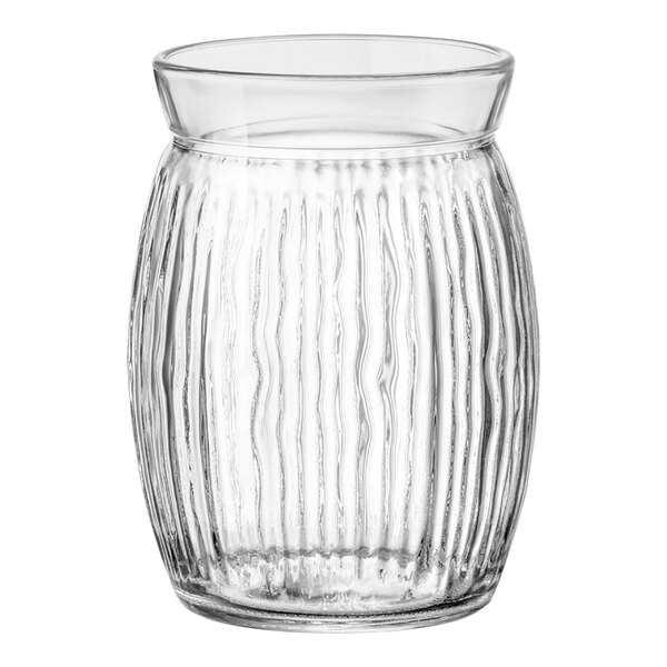 A clear glass jar with a curved pattern and ribbed rim.