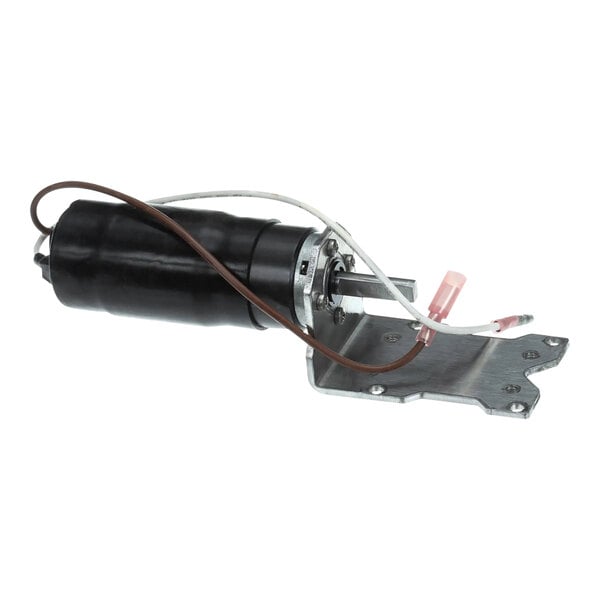 A black and silver Garland / US Range AC motor with wires attached.