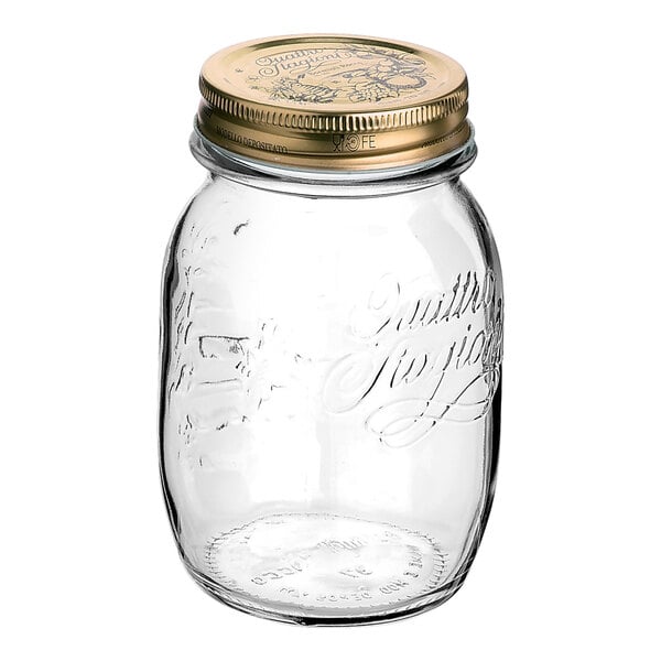 A close-up of a Bormioli Rocco Quattro Stagioni glass jar with a gold lid.