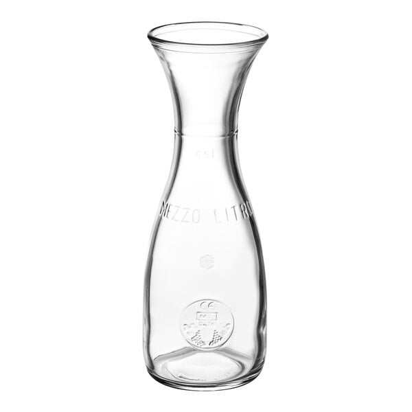A clear glass Bormioli Rocco carafe with a white cap on the neck.