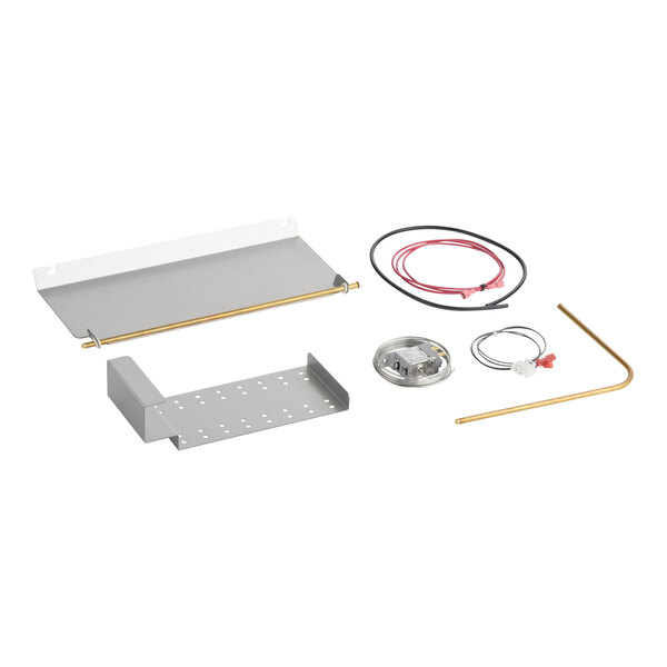 A cube dispenser mount kit with metal brackets, wiring, and hardware components.