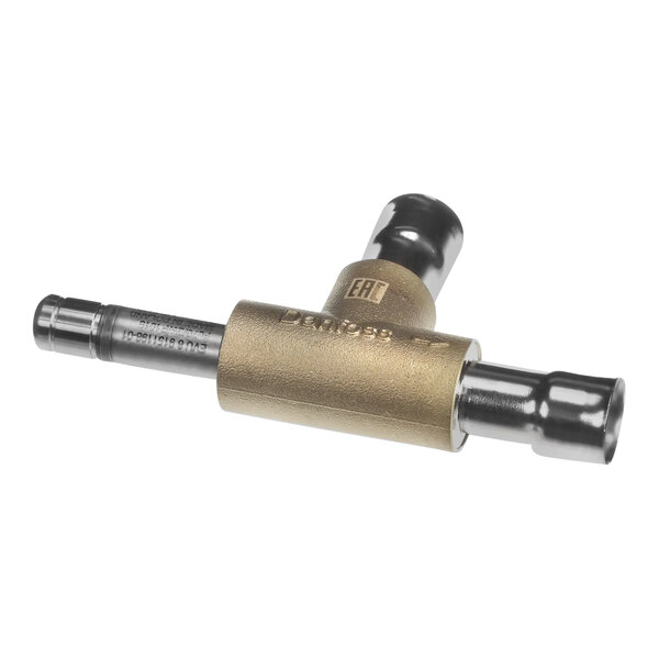 An Ice-O-Matic solenoid valve kit with brass and metal parts.