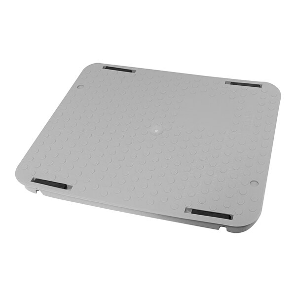 A gray plastic cover with black handles for an Endura grease trap.