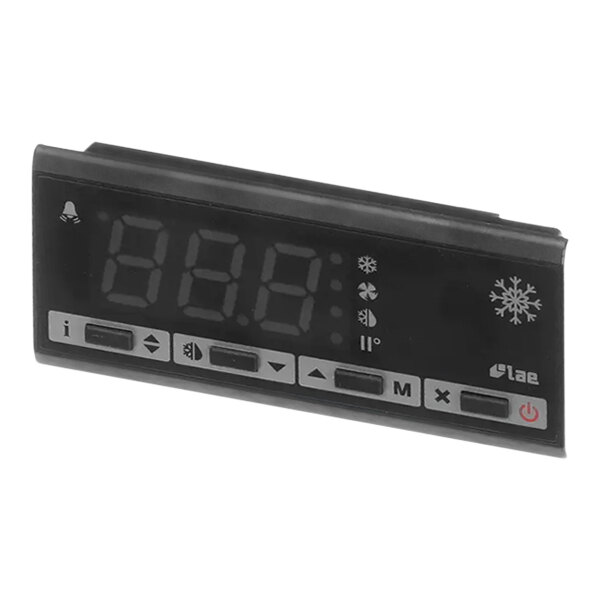 A Traulsen freezer control display with a black digital clock and buttons.