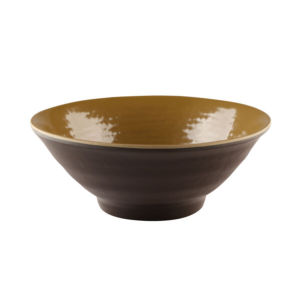 A brown bowl with a black and brown rim.