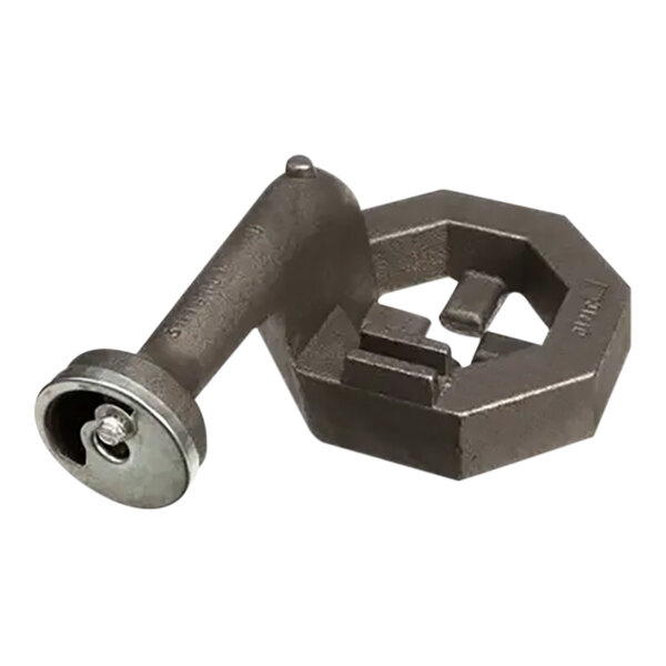 A metal pipe clamp with a round metal nut.
