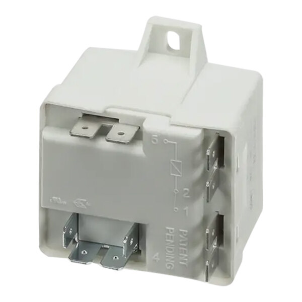 A close-up of a white Ice-O-Matic relay with metal parts.