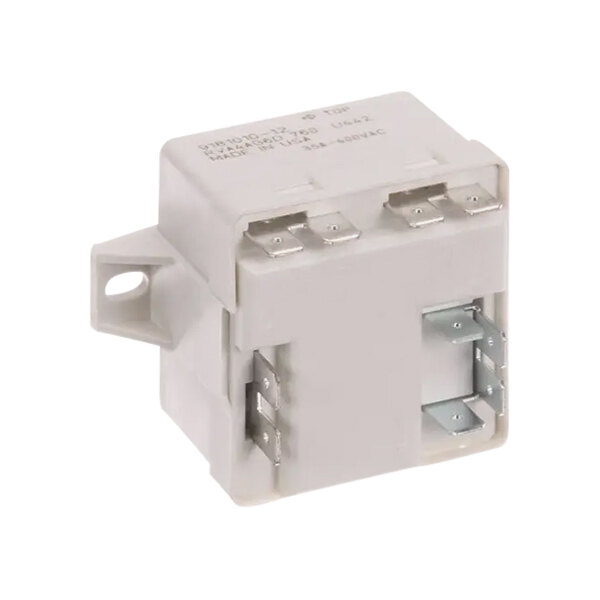 A white Ice-O-Matic relay with metal connectors.