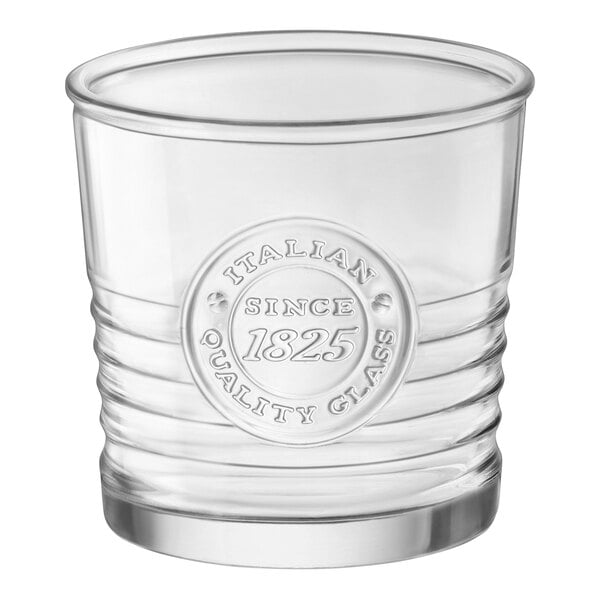 A close-up of a clear DOF tumbler with a Bormioli Rocco logo.