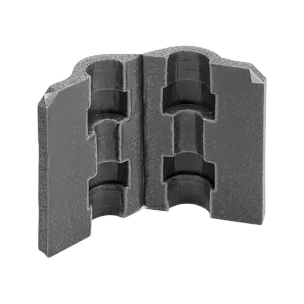 A grey Follett Corporation insulation piece with two holes.