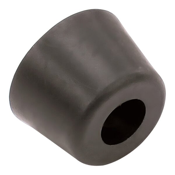 A close up of a black rubber cylinder with a hole in the middle.