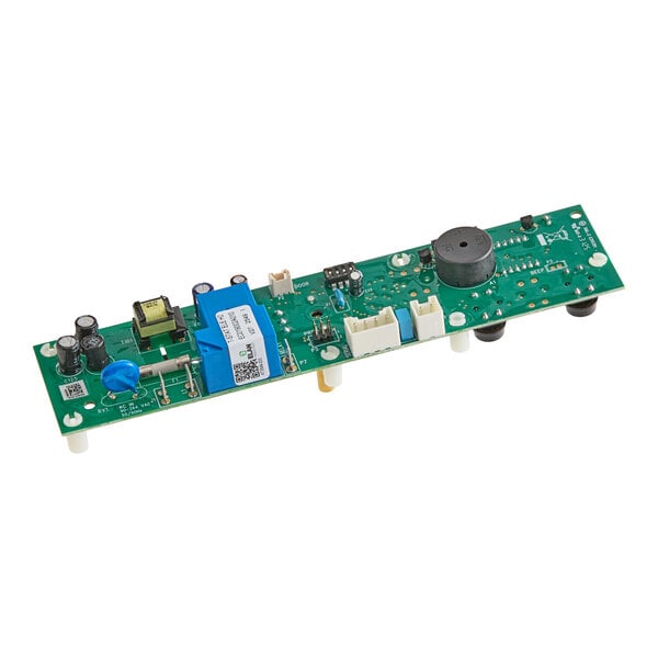 A green electronic circuit board with various components including capacitors, connectors, and a relay, mounted on white standoffs.