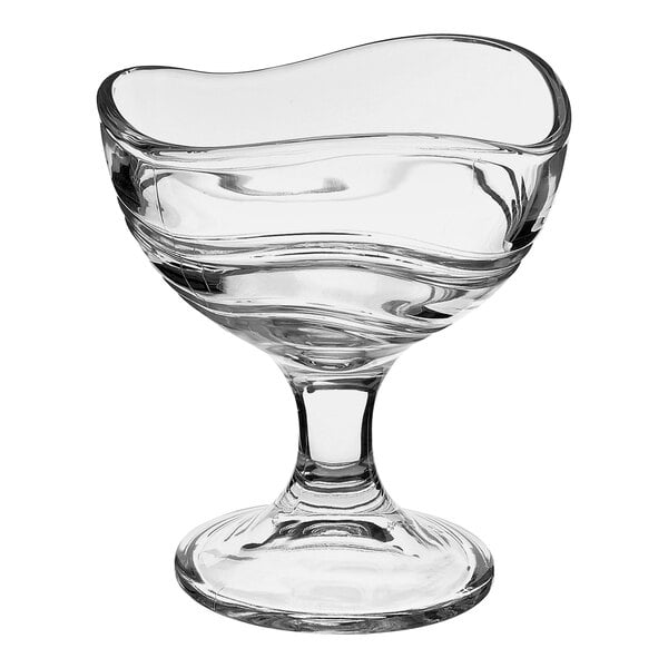 A clear glass bowl with a curved edge.