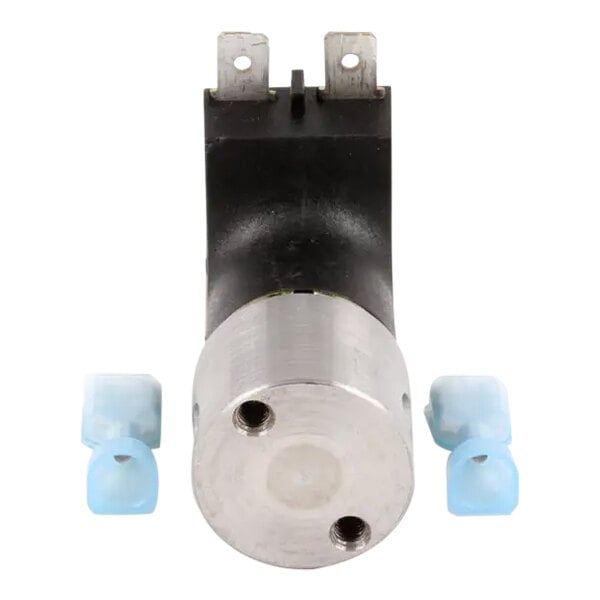 A Follett Corporation water solenoid valve with blue plastic caps.