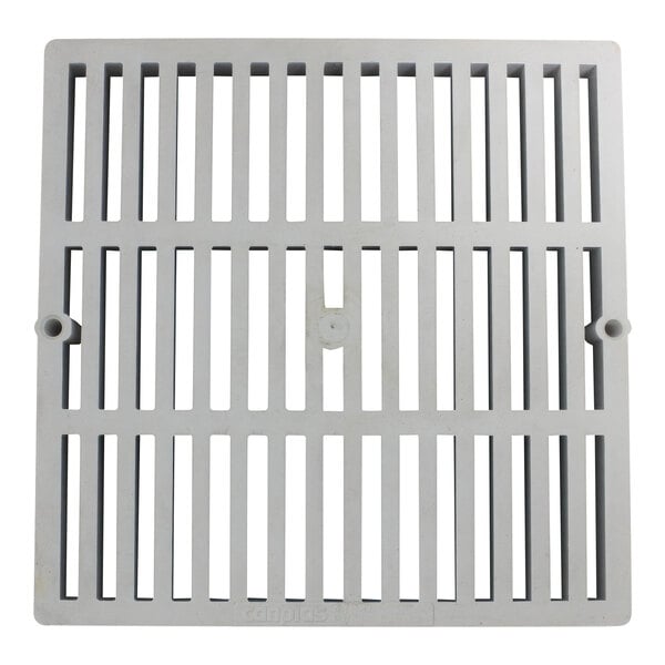 An Endura white square PVC floor grate with bars.
