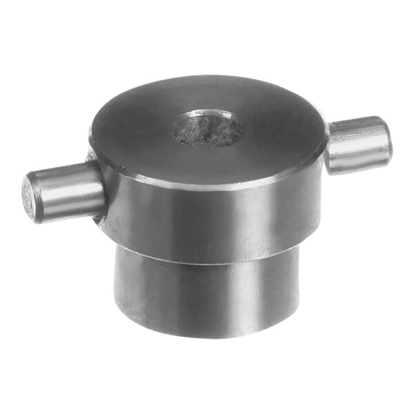 A metal object with two small holes.