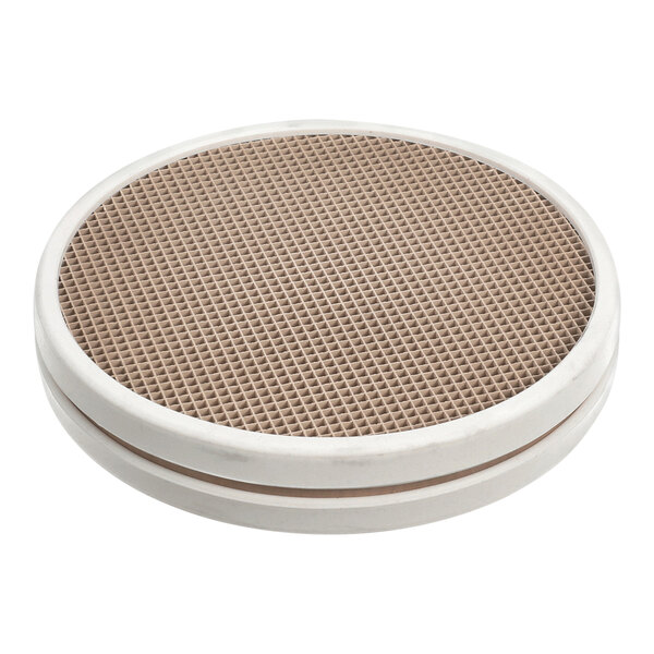 A round white object with a brown circular surface.