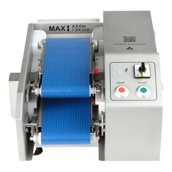 A CHICKEN SLICER AUTO machine with blue rolls of paper.
