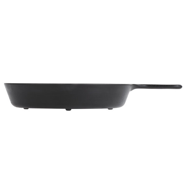 A black pan with a handle.