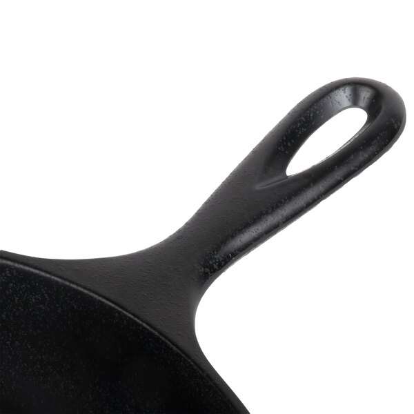 A close-up of an Elite Global Solutions faux cast iron fry pan with a handle.